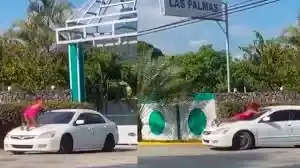 Mujer sorprende a su esposo saliendo de un motel con la amante